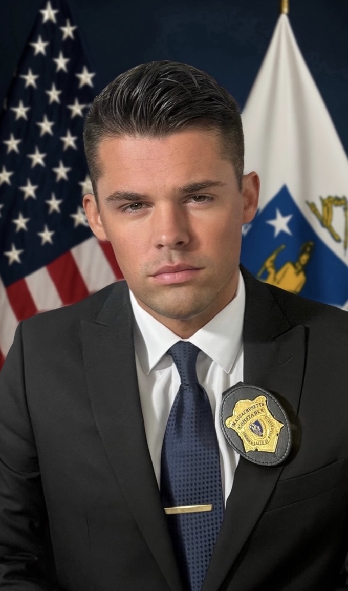 Constable Alberto V. Morgante in official portrait with U.S. and Massachusetts flags